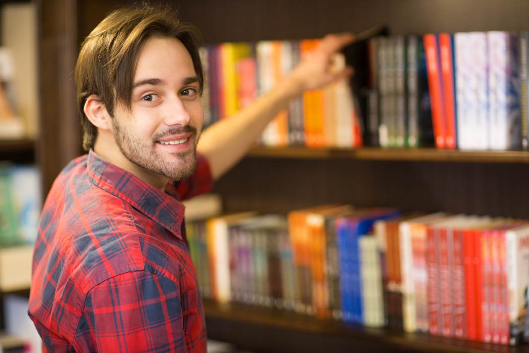 image of a male learner in the library