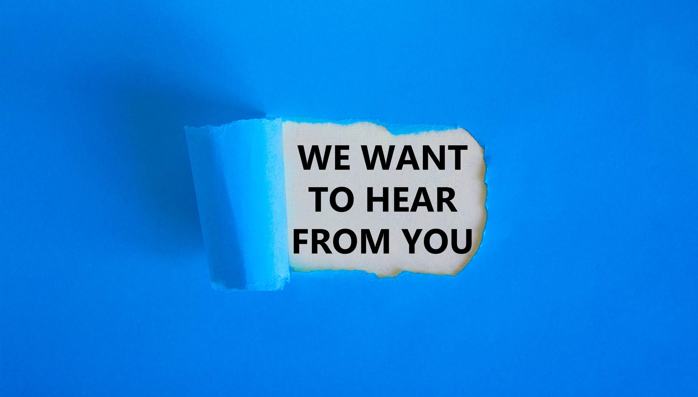 Graphic stating 'we want to hear from you'